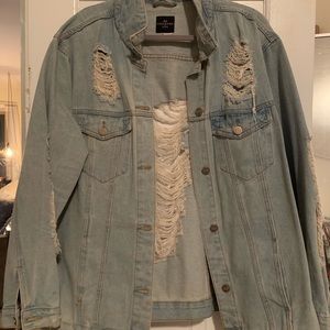 Distressed oversized denim jacket.
